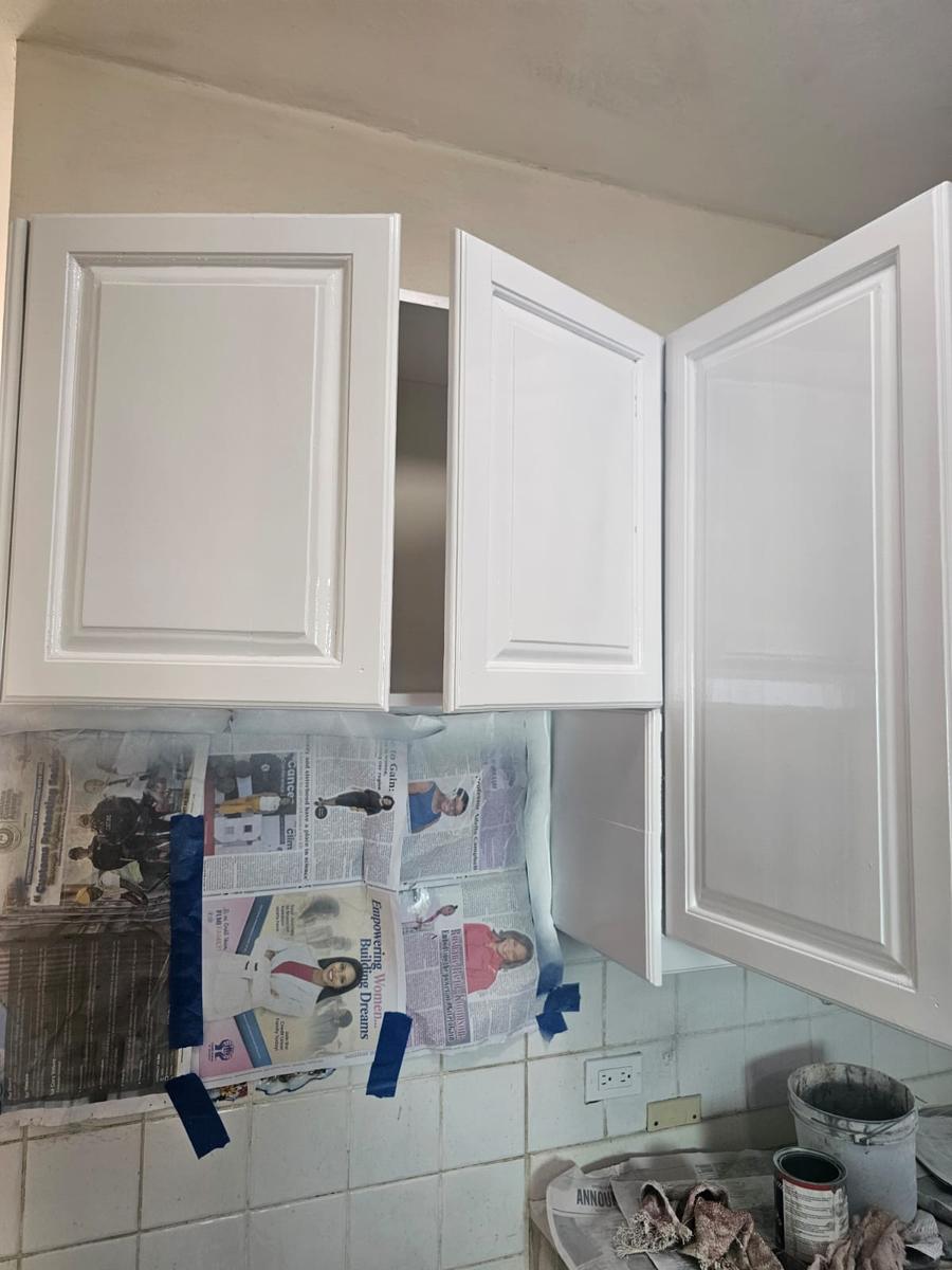 Cabinet refinishing: masked for spray