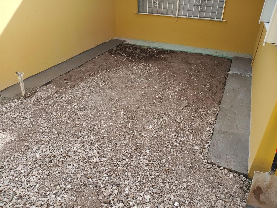 Courtyard base prepared and edged in concrete